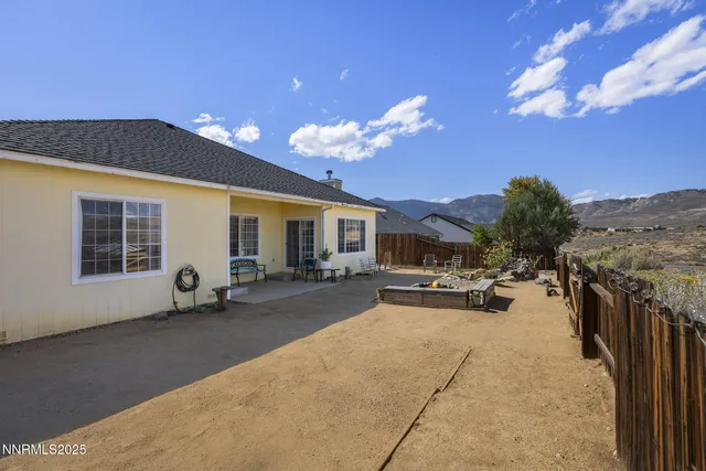a view of a house with outdoor space and a porch