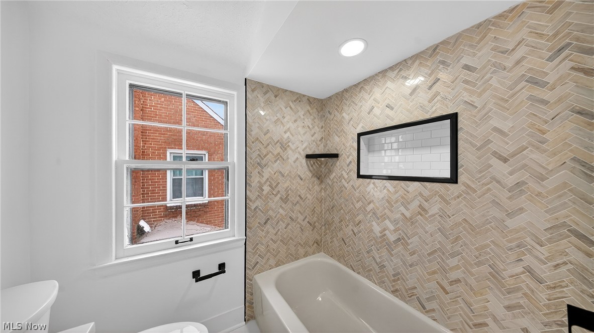 16811 Invermere Avenue Cleveland, OH 44128 - Photo 27 of 47 Bathroom with toilet and bathing tub / shower combination