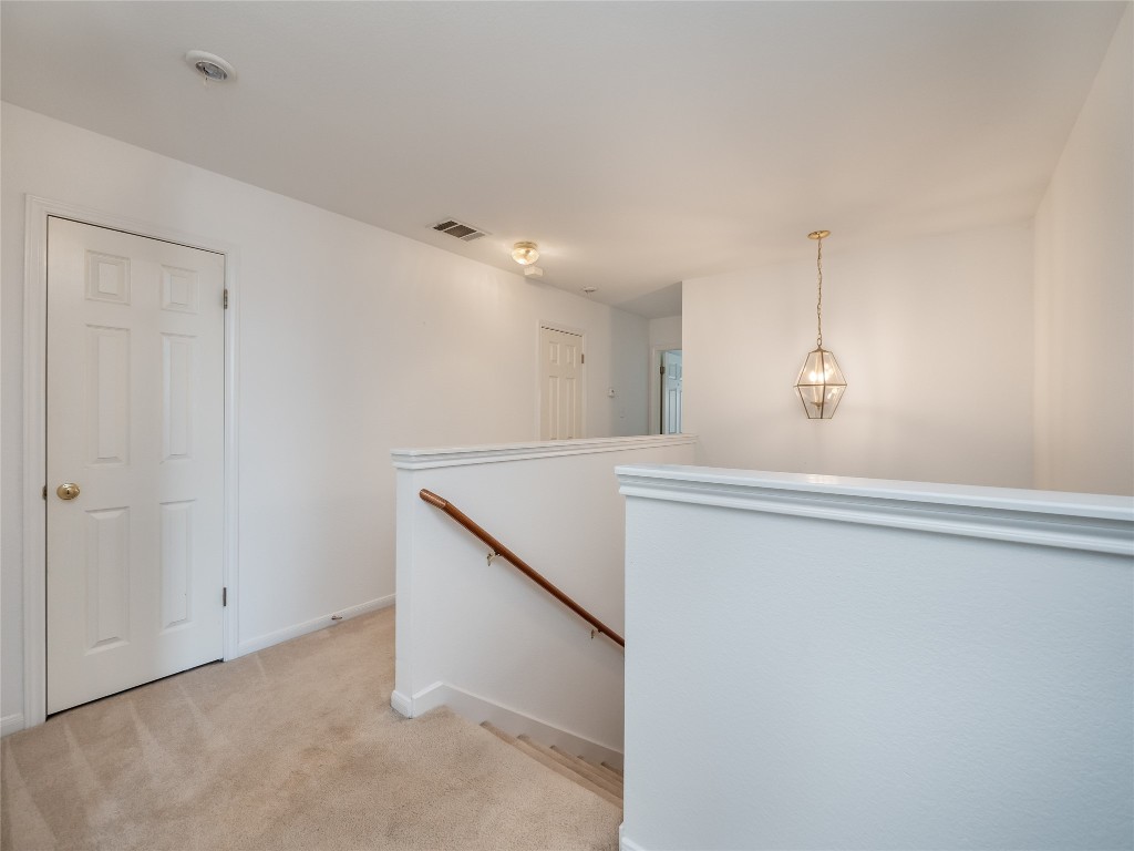 1819 Rutherford Drive Leander, TX 78641 - Photo 20 of 36 a view of an empty room with windows