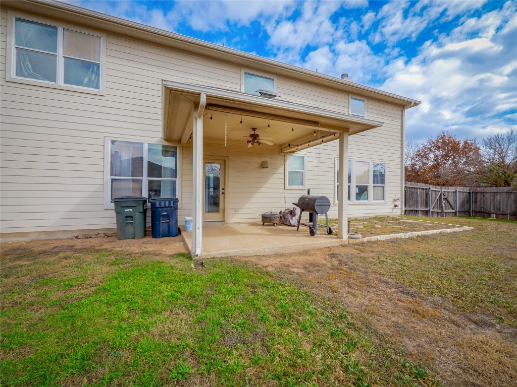 1819 Rutherford Drive Leander, TX 78641 - Photo 30 of 36 a view of a house with backyard and porch