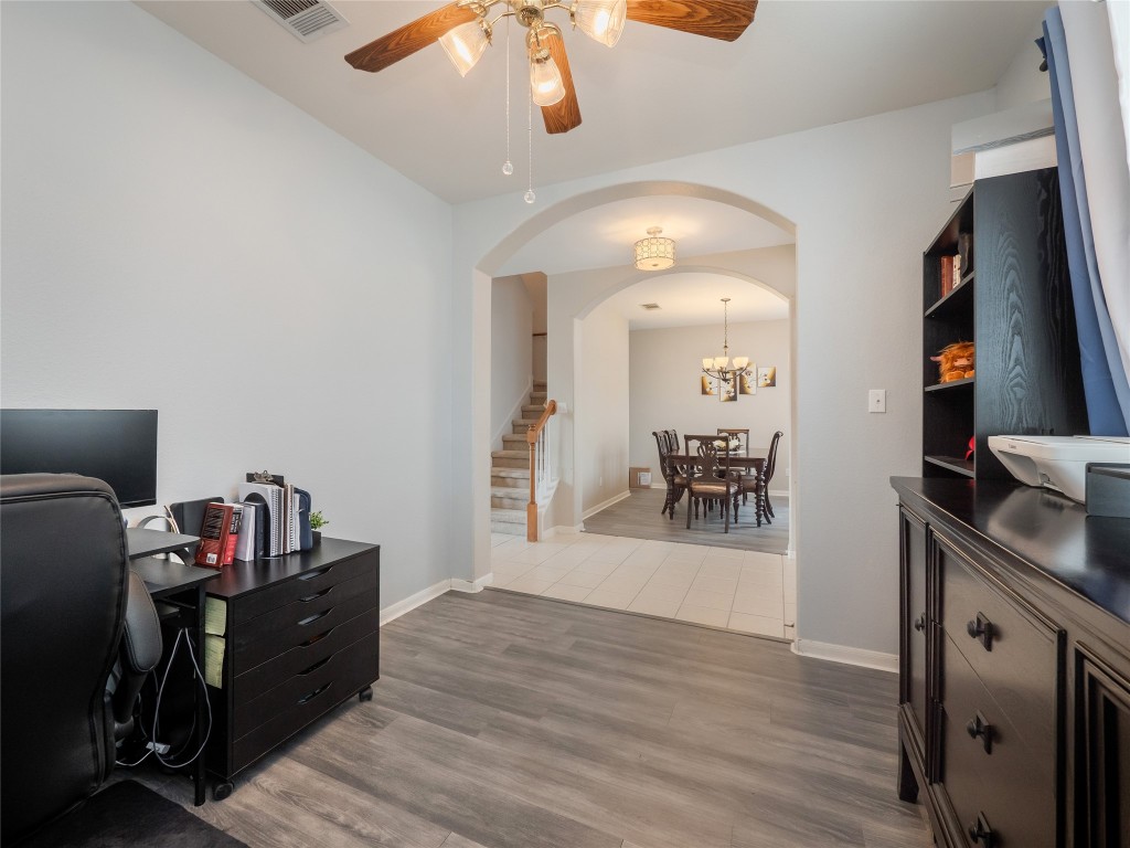 1819 Rutherford Drive Leander, TX 78641 - Photo 7 of 36 a bedroom with furniture and a wooden floor