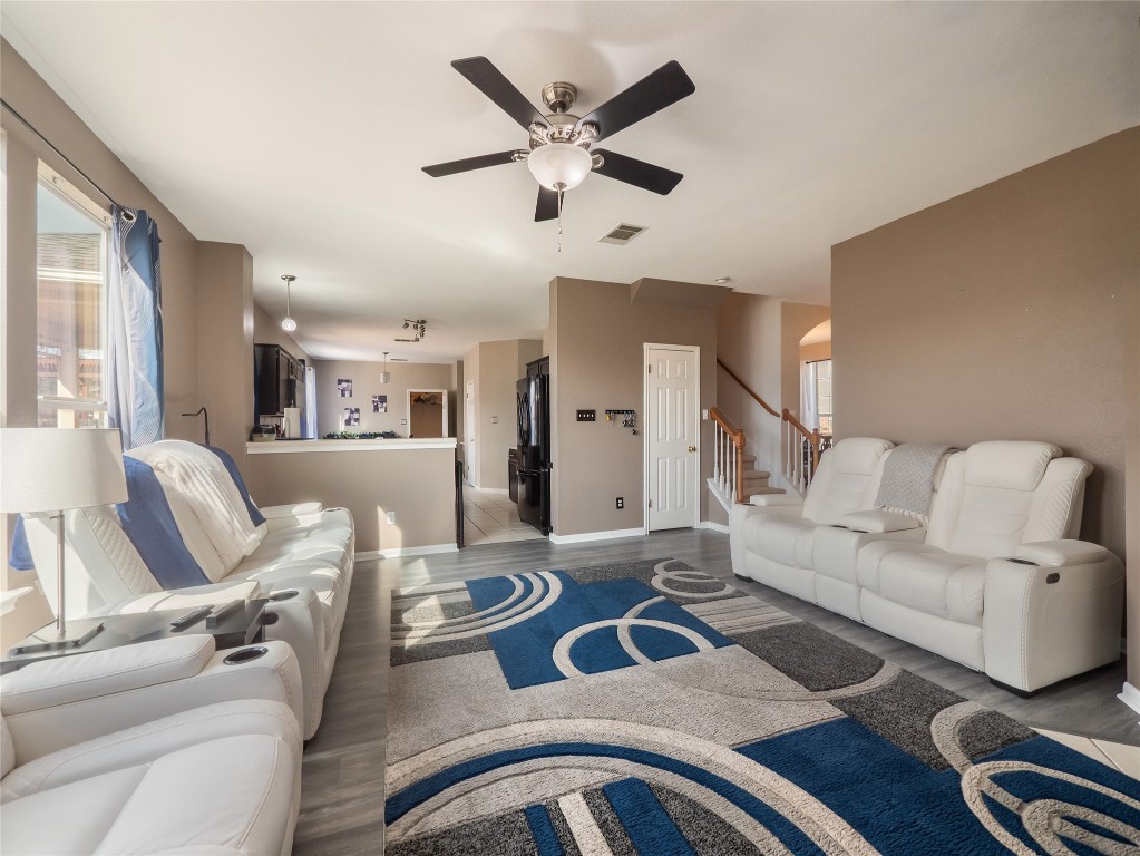 1819 Rutherford Drive Leander, TX 78641 - Photo 9 of 36 a living room with furniture and a large window