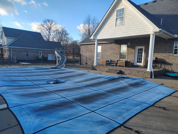 a front view of house with yard outdoor seating and wooden floor