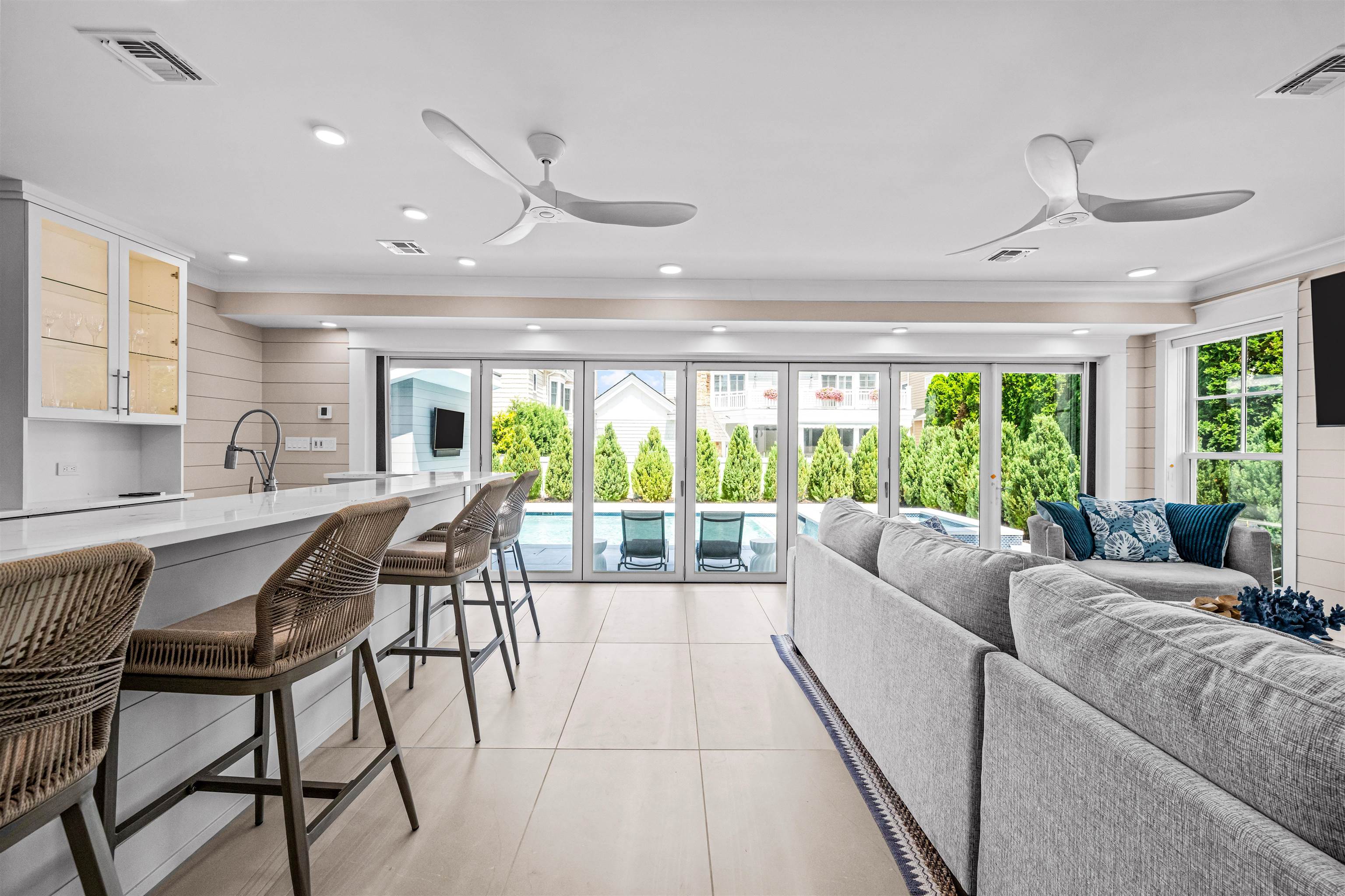 151 37th Street Avalon, NJ 08202 - Photo 11 of 50 a living room with furniture and a large window
