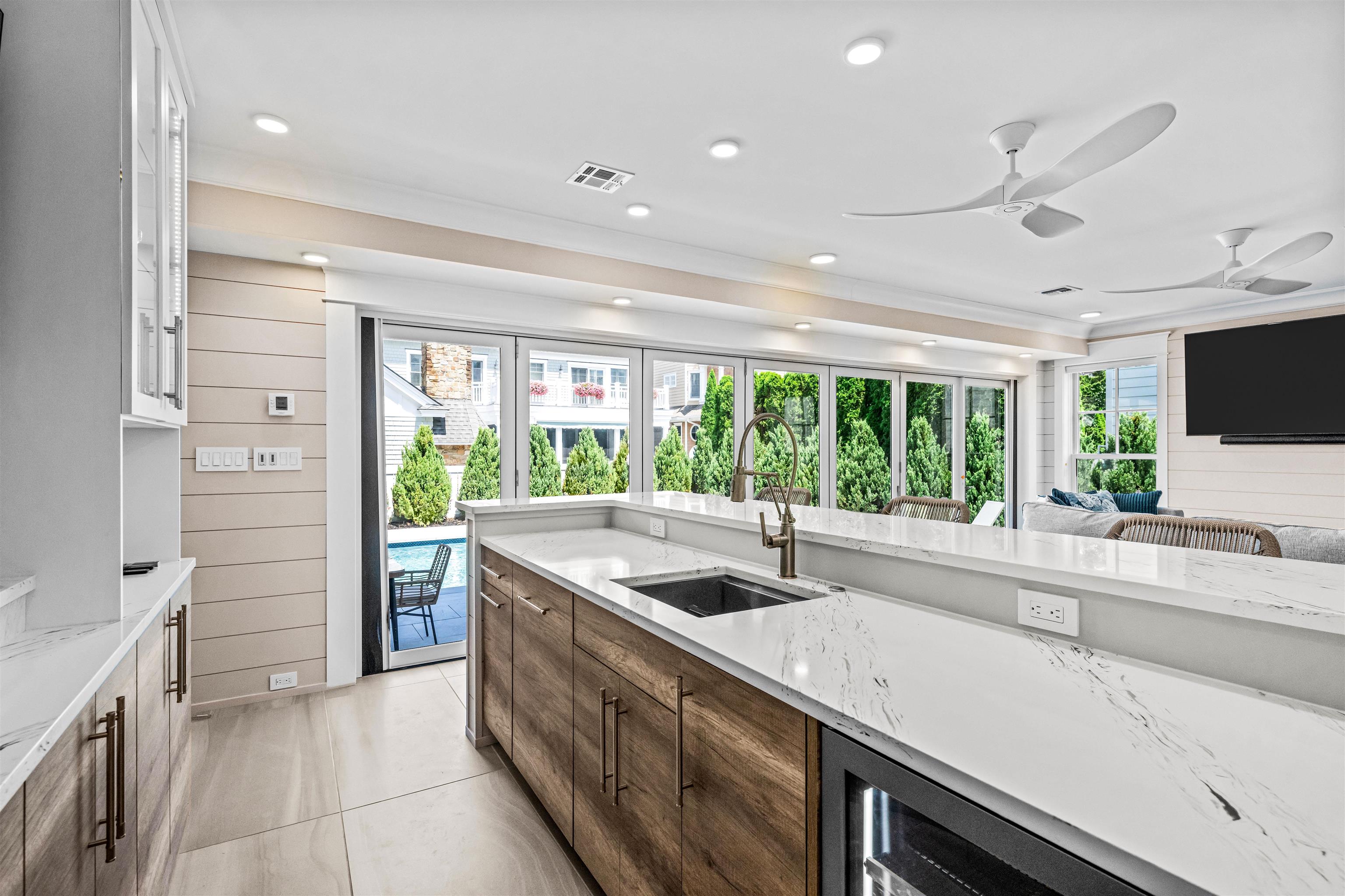 151 37th Street Avalon, NJ 08202 - Photo 14 of 50 a kitchen with a sink and a large window