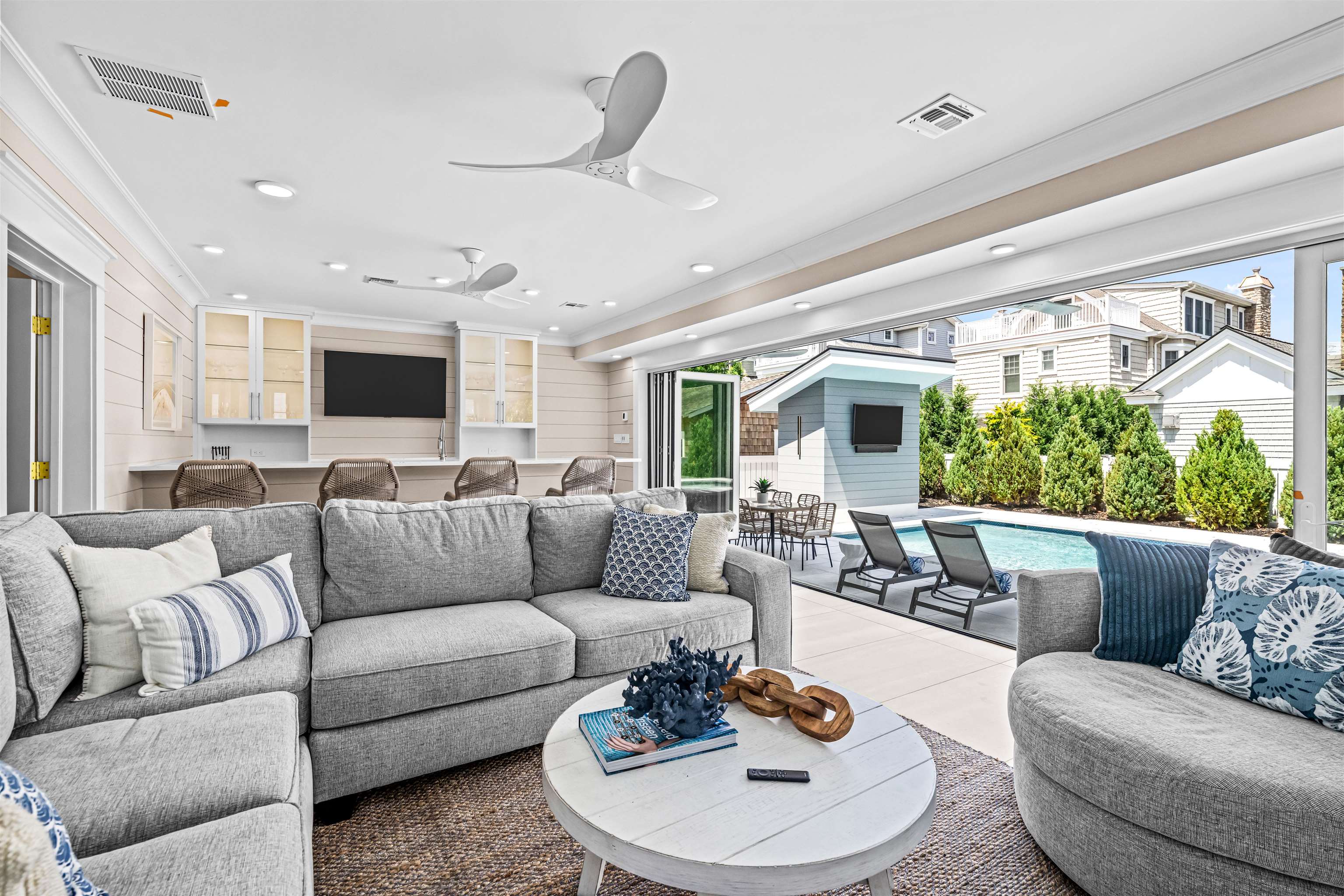 151 37th Street Avalon, NJ 08202 - Photo 17 of 50 a living room with furniture and a large window