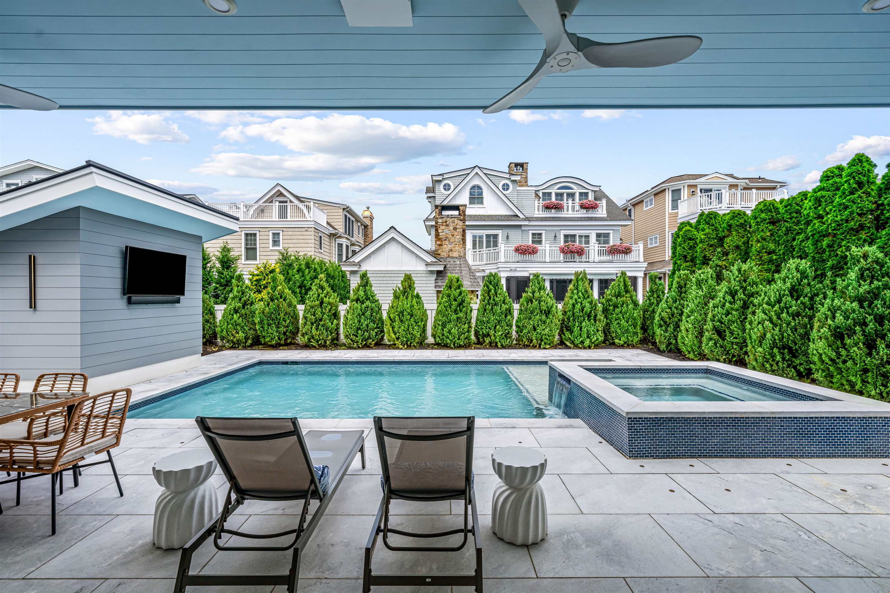 151 37th Street Avalon, NJ 08202 - Photo 19 of 50 a view of a chairs and table in the patio