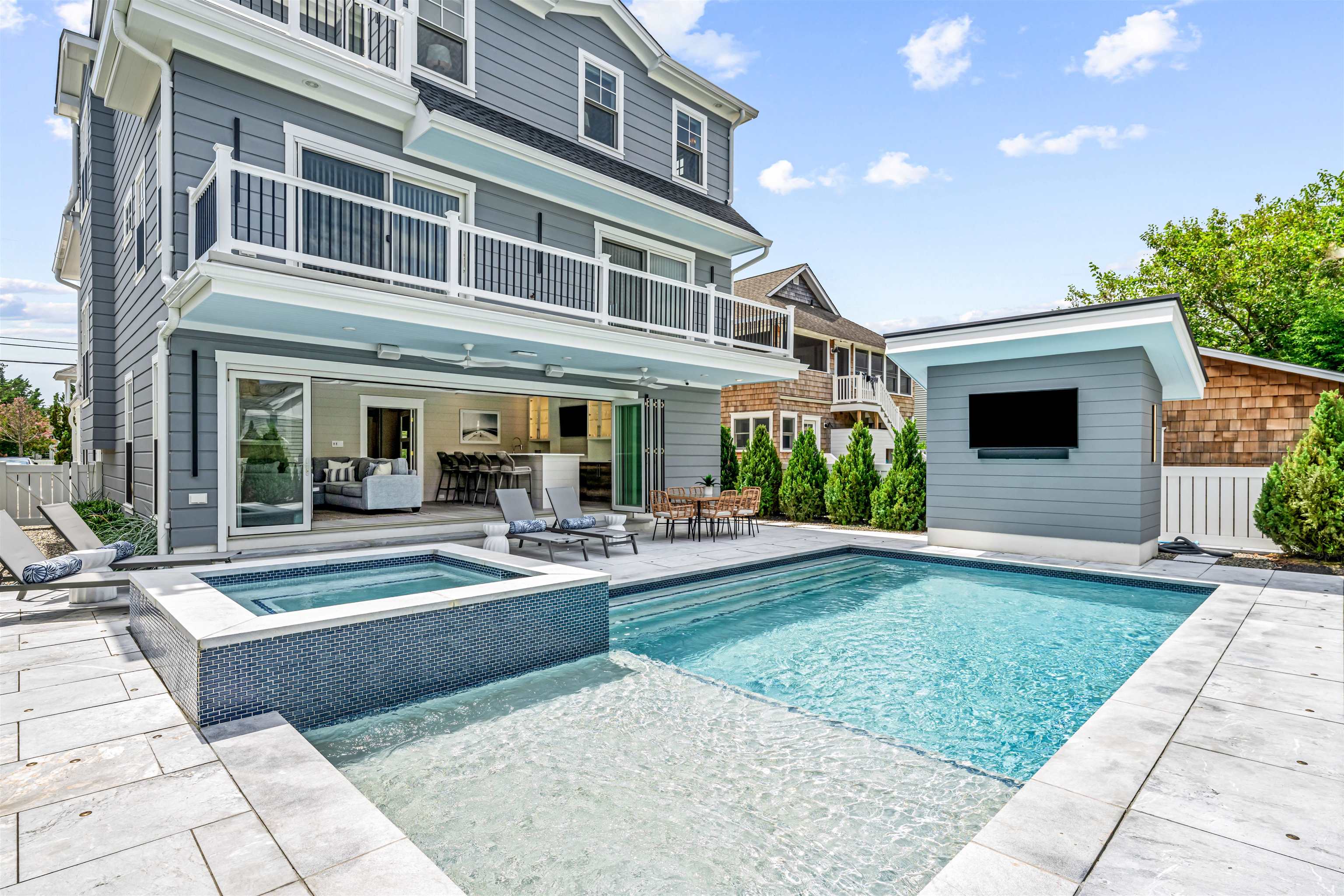 151 37th Street Avalon, NJ 08202 - Photo 21 of 50 a view of a house with sitting area and garden