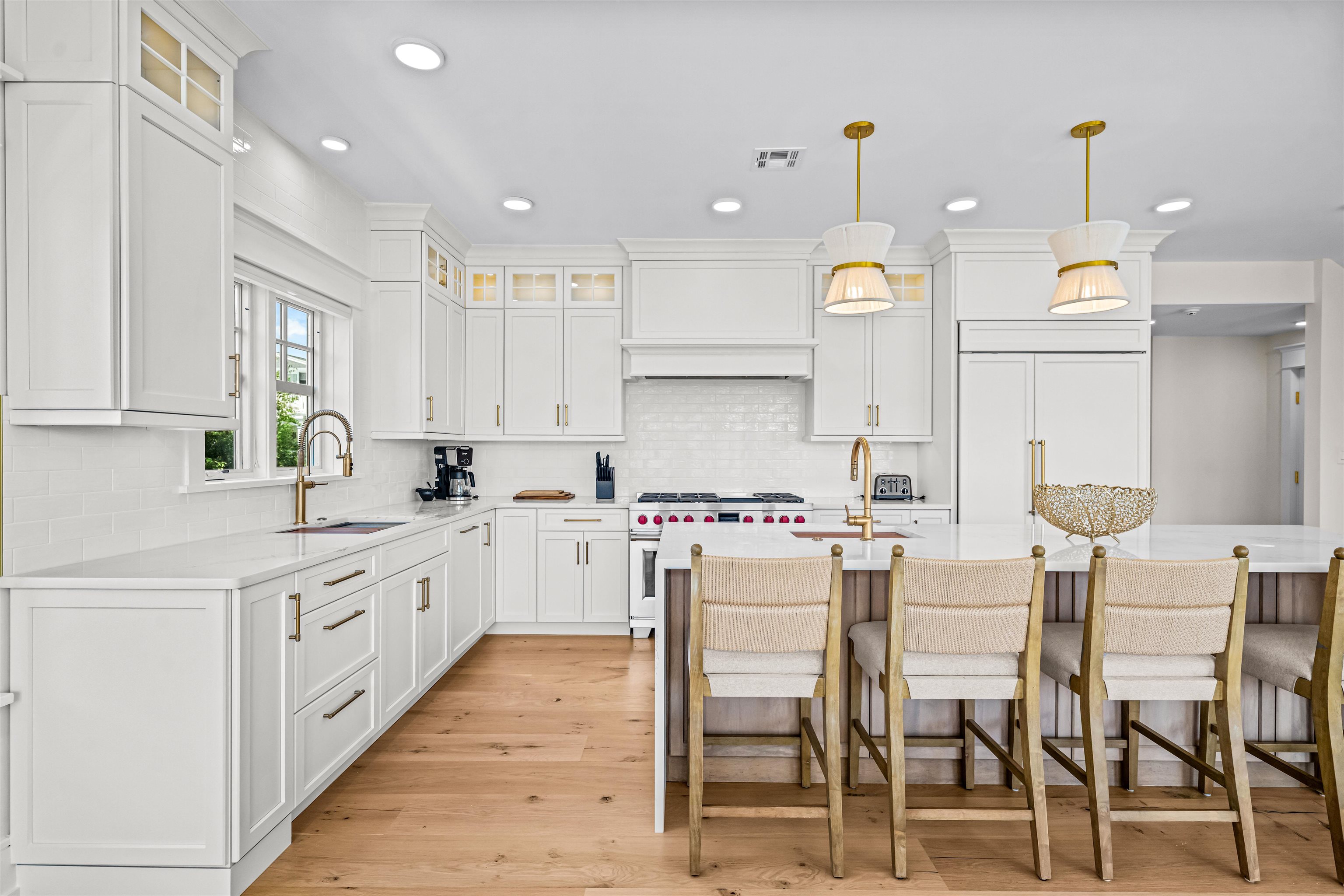 151 37th Street Avalon, NJ 08202 - Photo 23 of 50 a kitchen with white cabinets and sink