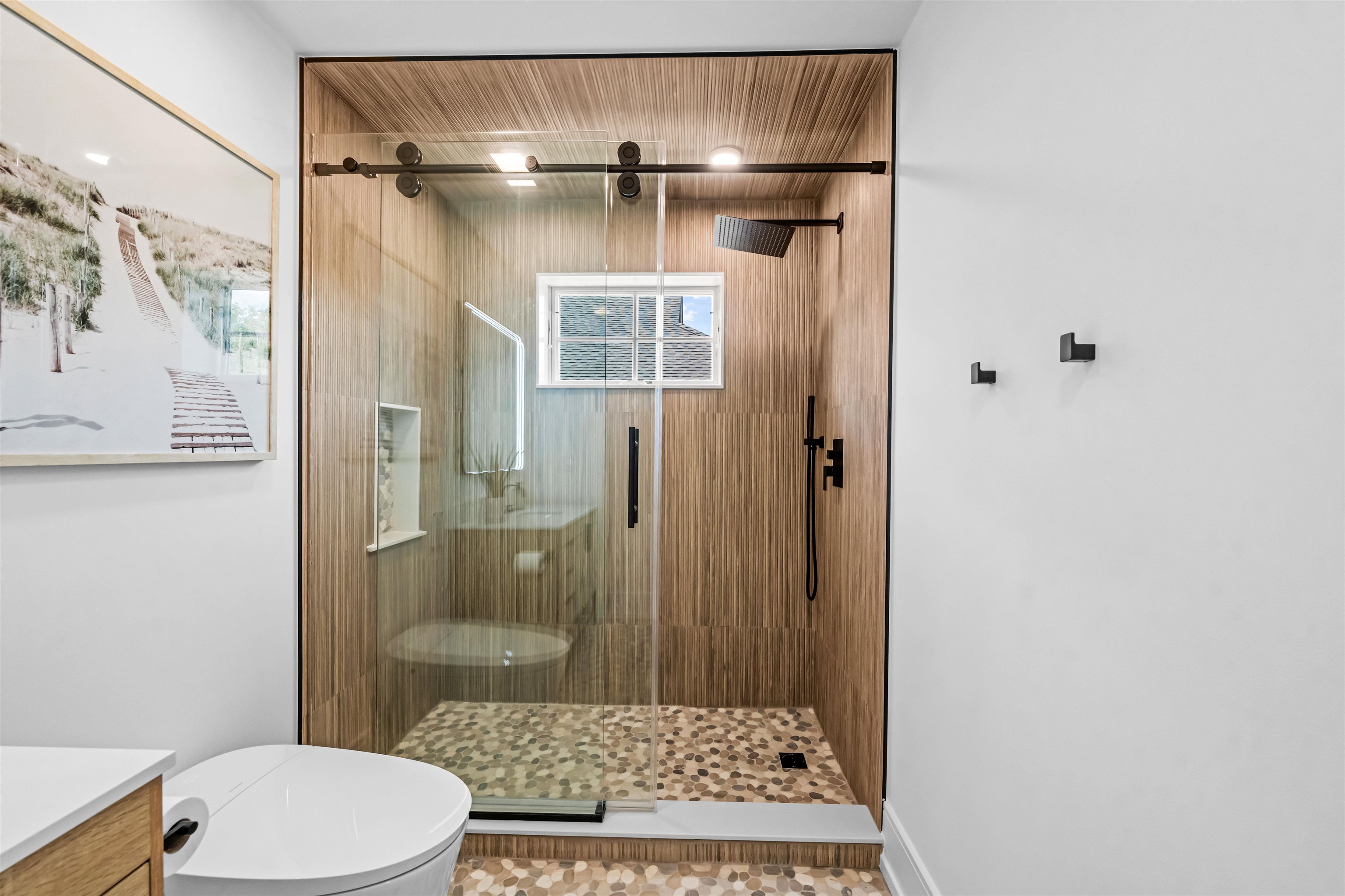 151 37th Street Avalon, NJ 08202 - Photo 34 of 50 a bathroom with a toilet and a shower