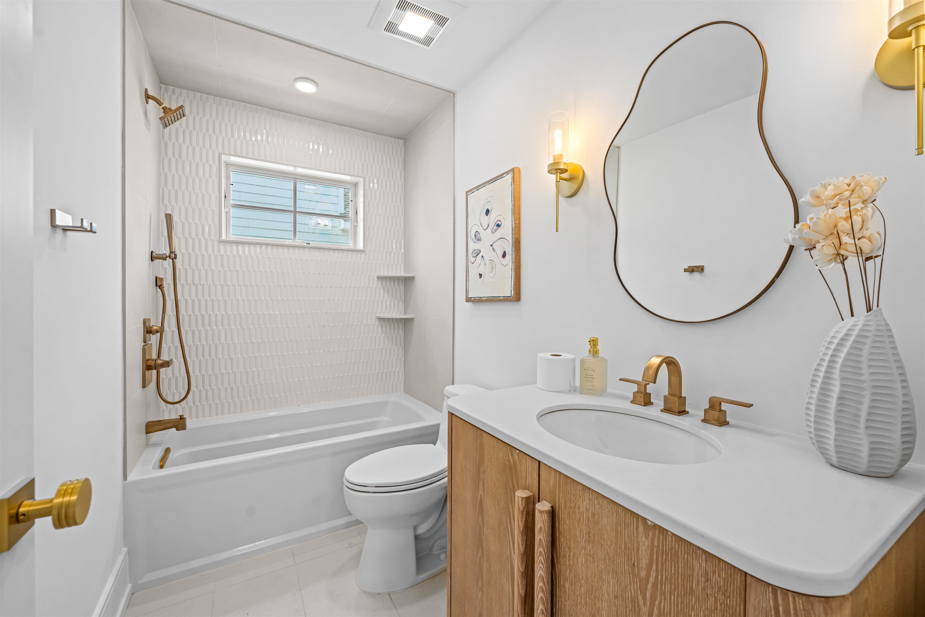 151 37th Street Avalon, NJ 08202 - Photo 37 of 50 a bathroom with a sink toilet and shower