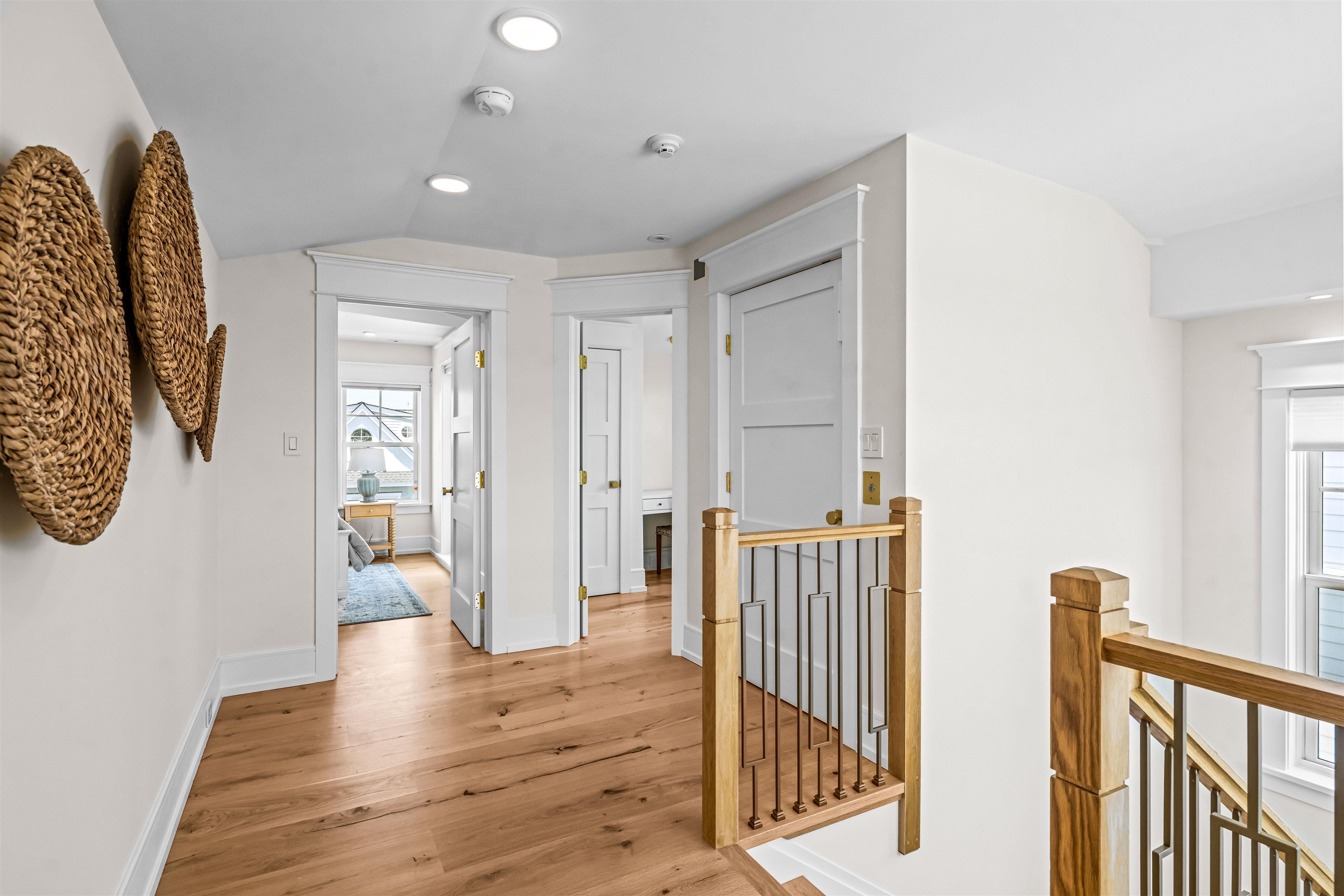151 37th Street Avalon, NJ 08202 - Photo 38 of 50 a view of a hallway with wooden floor and a living room