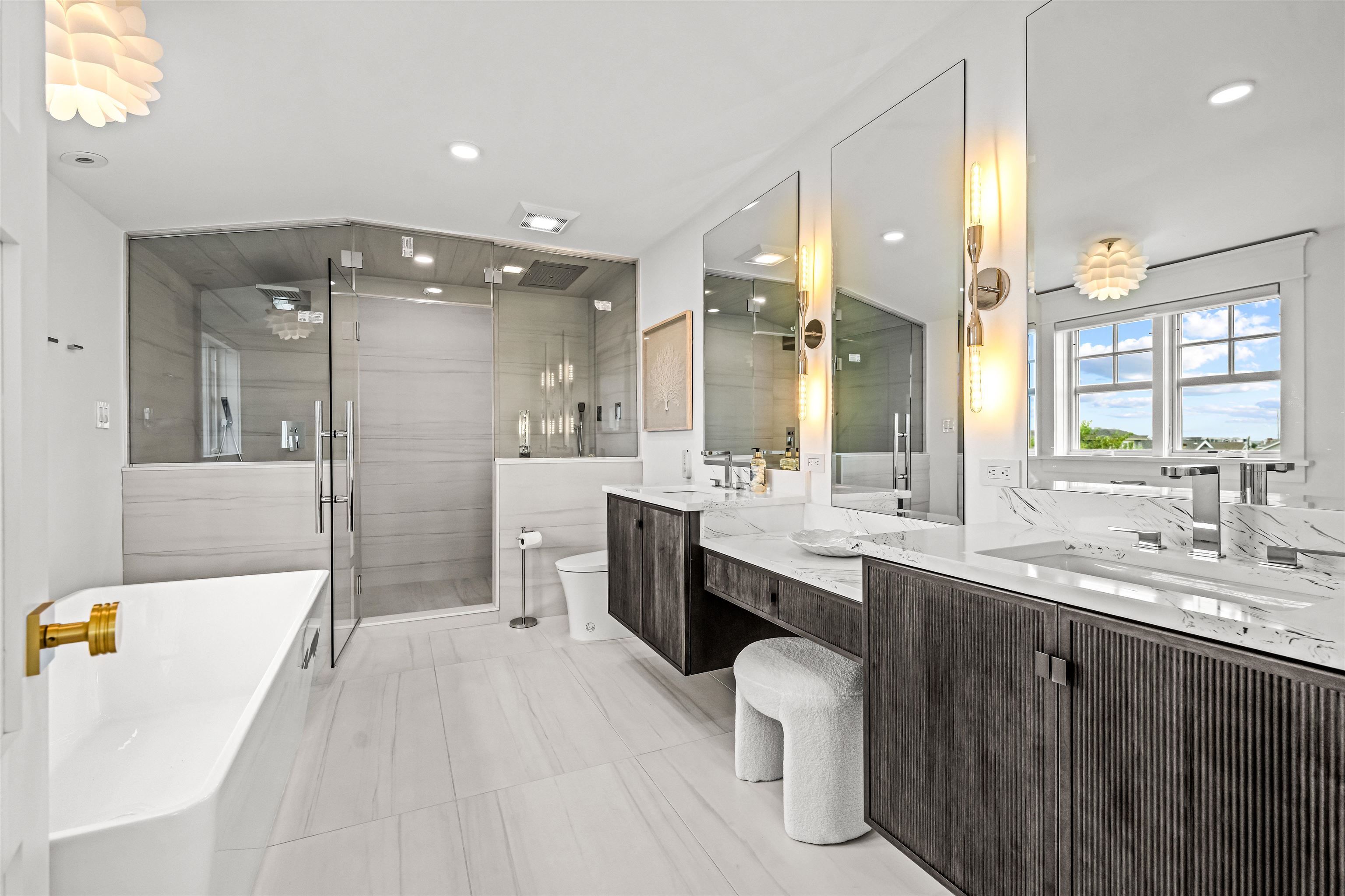 151 37th Street Avalon, NJ 08202 - Photo 42 of 50 a large bathroom with a large tub sink shower and mirror