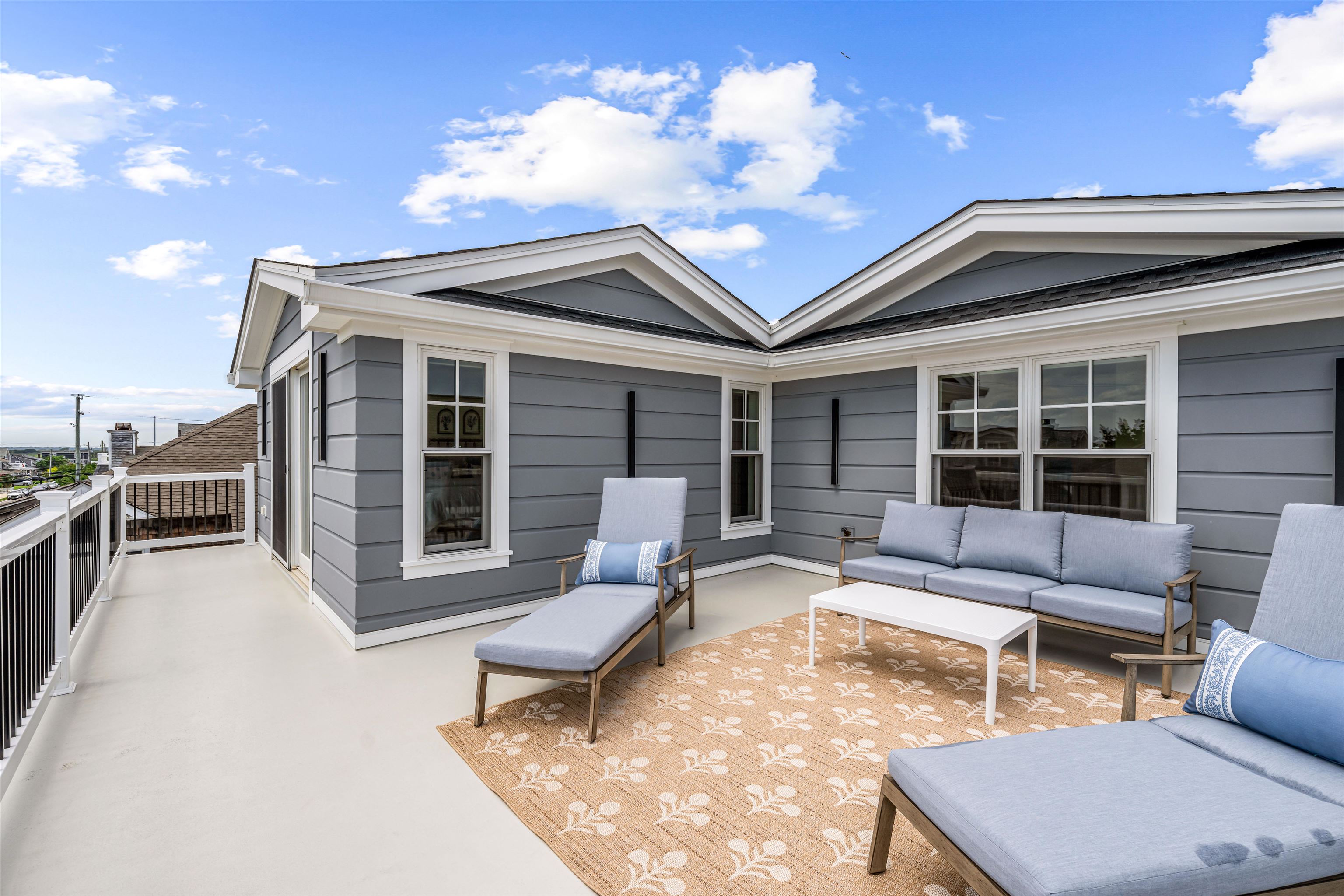 151 37th Street Avalon, NJ 08202 - Photo 47 of 50 a outdoor space with patio the couches and a dining table with the view of kitchen