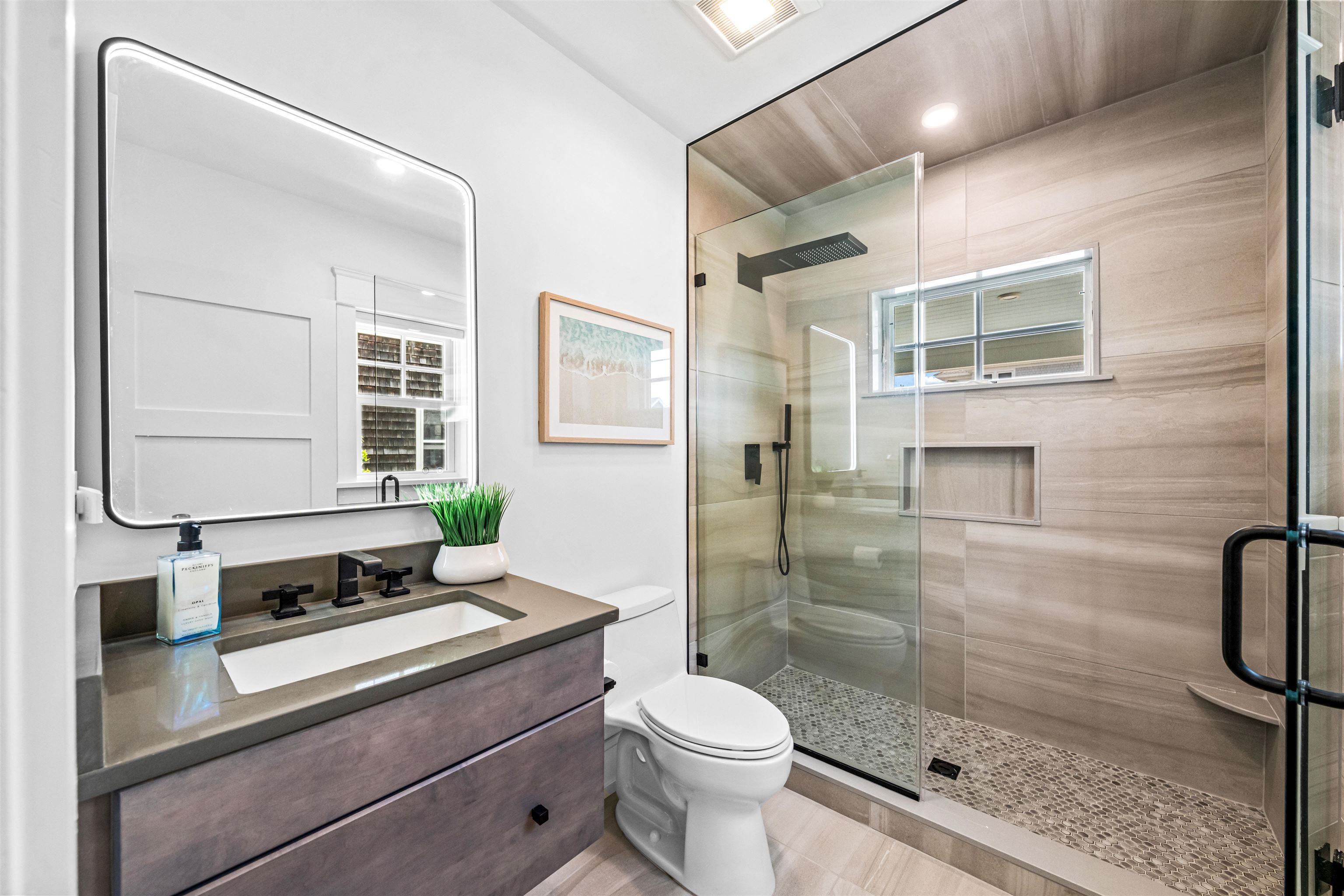 151 37th Street Avalon, NJ 08202 - Photo 6 of 50 a bathroom with a sink toilet and shower