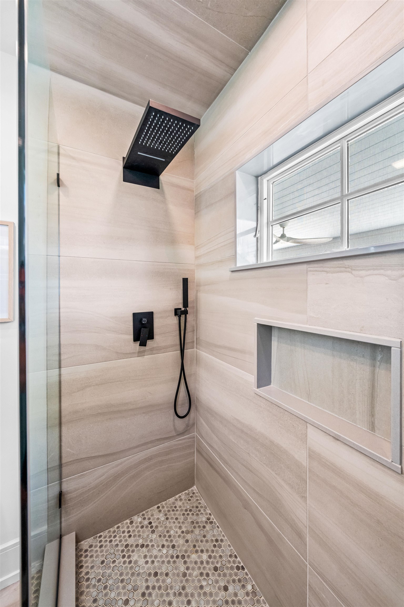 151 37th Street Avalon, NJ 08202 - Photo 7 of 50 a bathroom with a shower