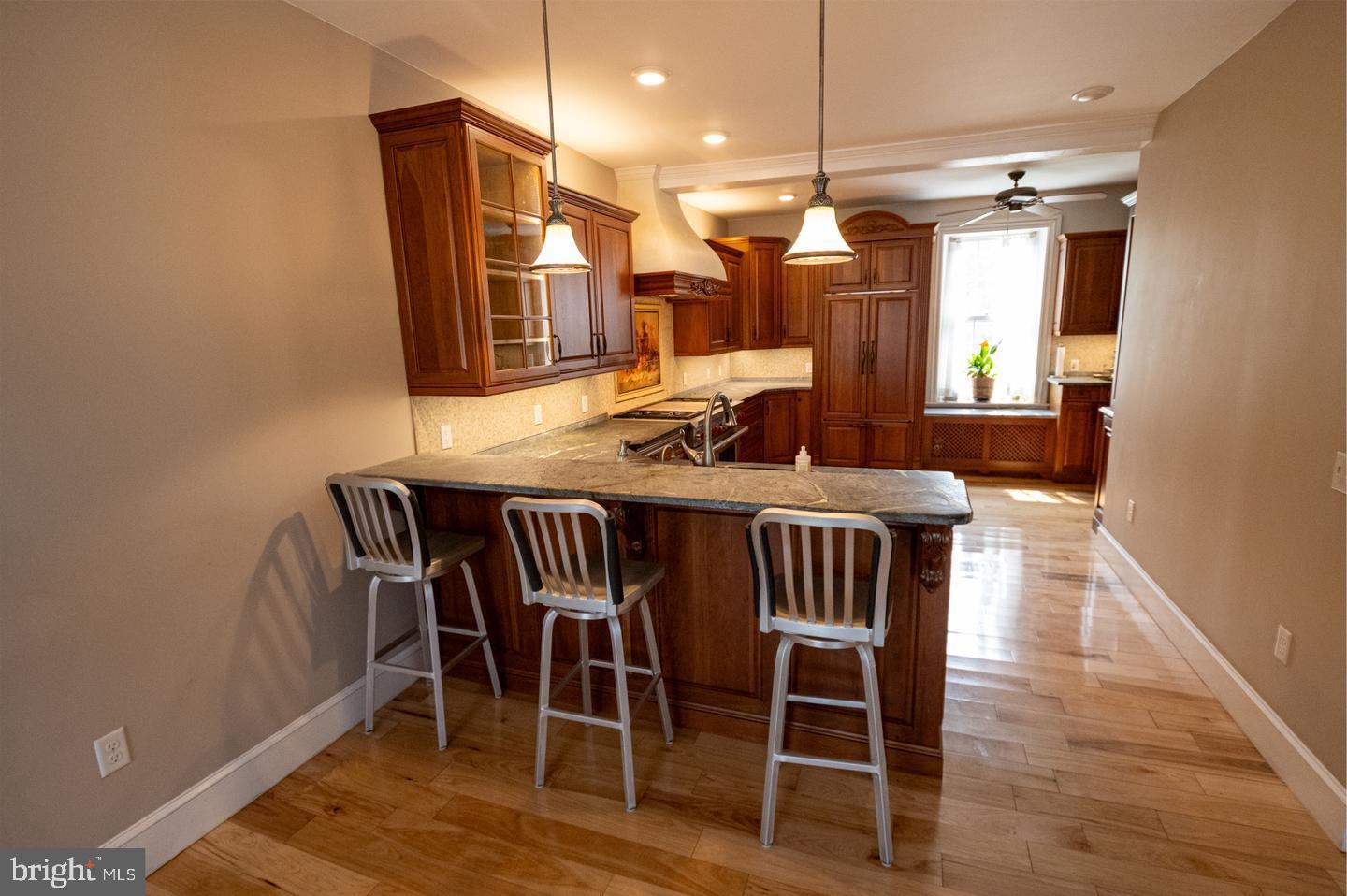 3498 Carlisle Road Gardners, PA 17324 - Photo 12 of 33 a view of a dining room with furniture and wooden floor