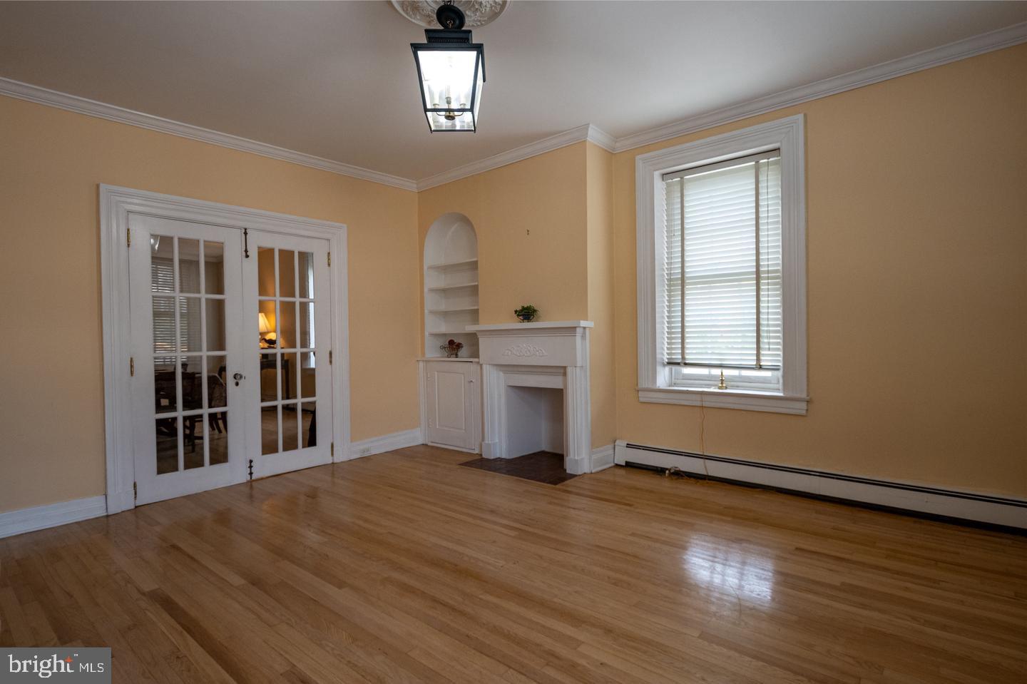3498 Carlisle Road Gardners, PA 17324 - Photo 17 of 33 an empty room with wooden floor and windows