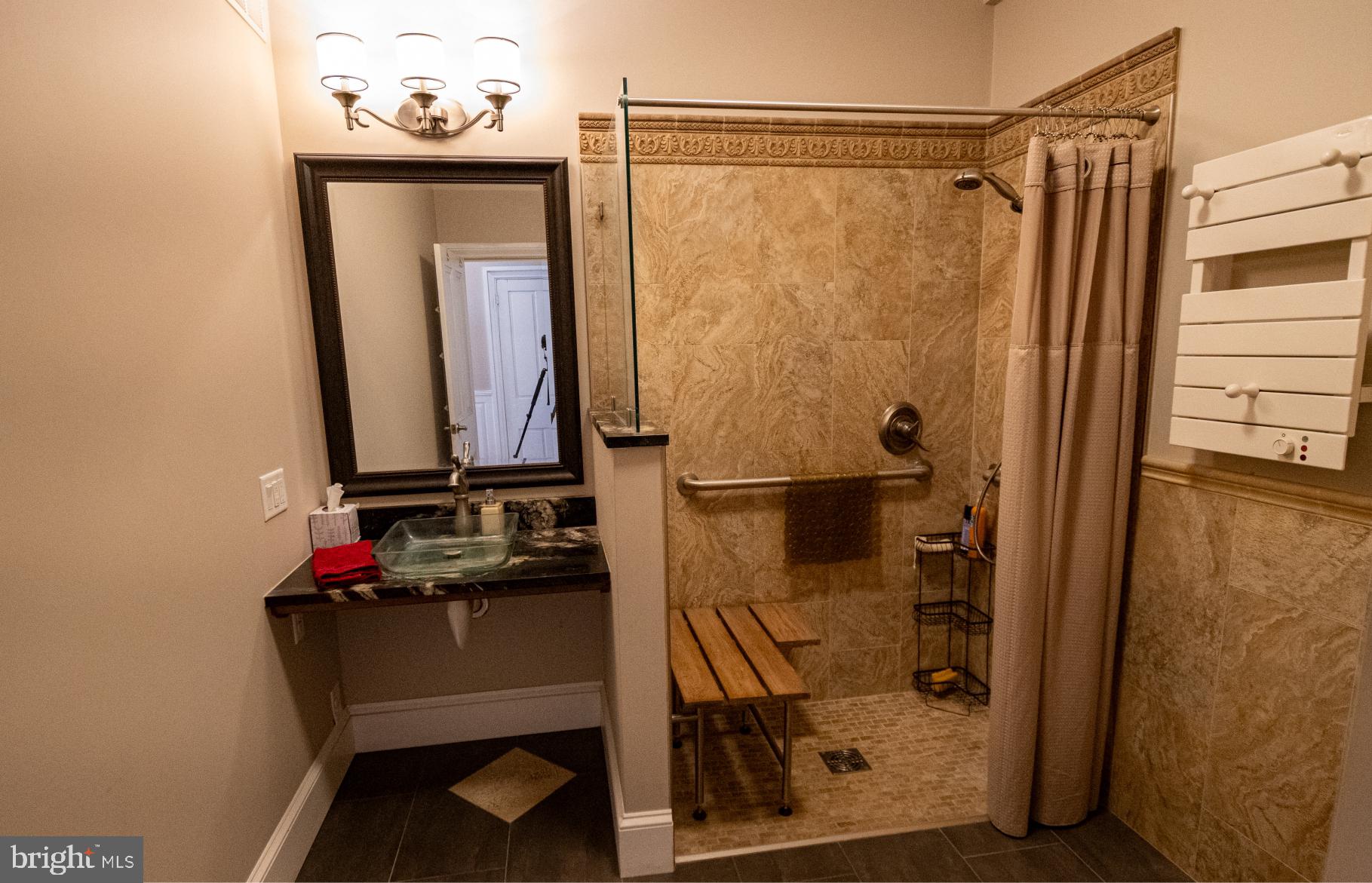 3498 Carlisle Road Gardners, PA 17324 - Photo 8 of 33 a bathroom with a sink a mirror and shower