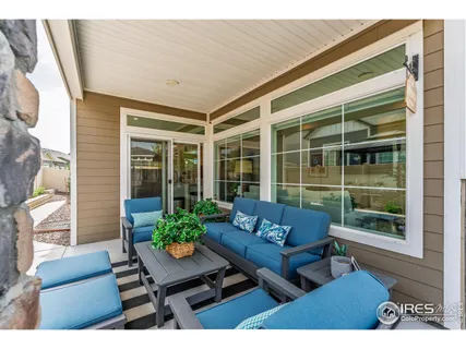 a outdoor living space with furniture and a potted plant