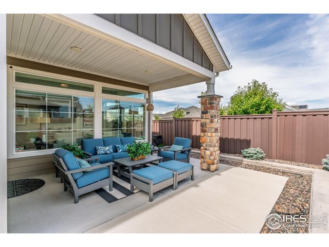 a outdoor living space with furniture and a couch