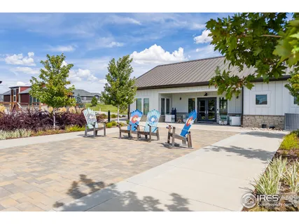 a house with swimming pool in front of it