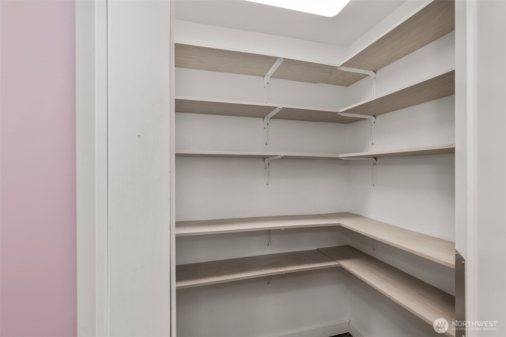 212 Willow Street Bremerton, WA 98310 - Photo 15 of 33 a storage room with empty racks