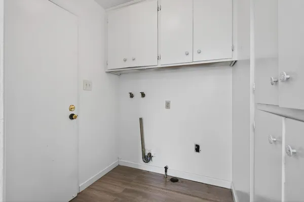 a view of small space with wooden floor