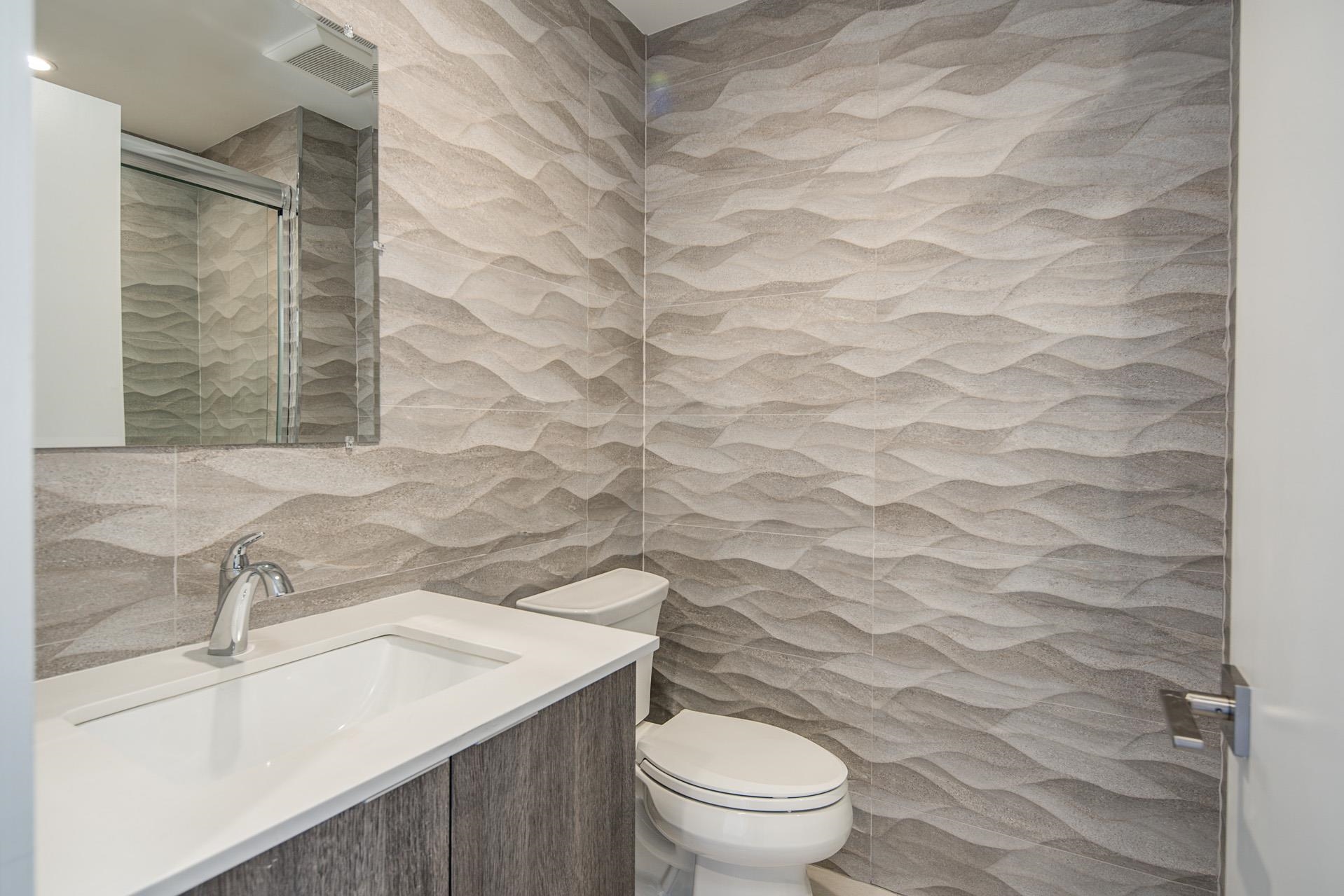 527 Monroe Street, Unit 3R Hoboken, NJ 07030 - Photo 17 of 22 a bathroom with a sink and a toilet