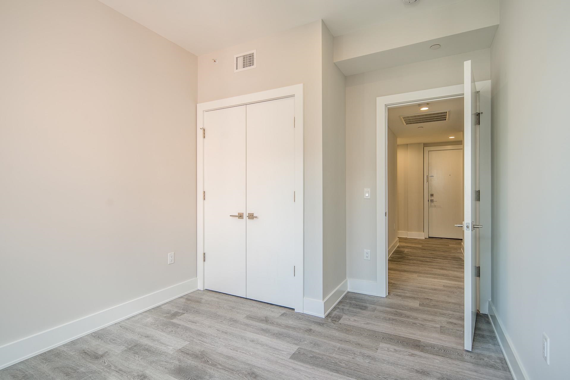 527 Monroe Street, Unit 3R Hoboken, NJ 07030 - Photo 19 of 22 a view of an empty room with wooden floor