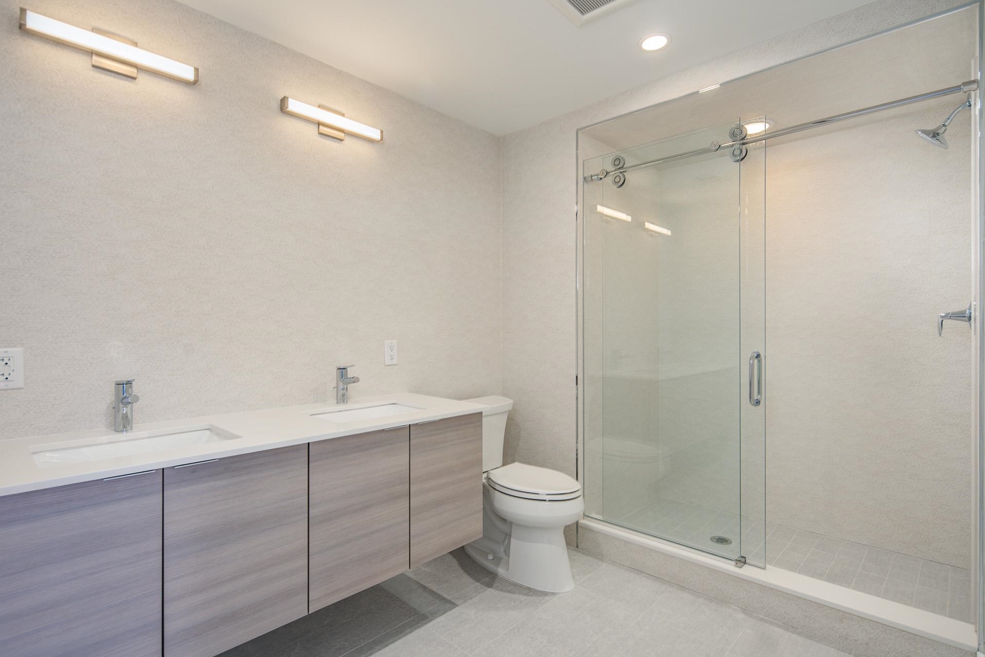 527 Monroe Street, Unit 3R Hoboken, NJ 07030 - Photo 21 of 22 a bathroom with a toilet sink and shower
