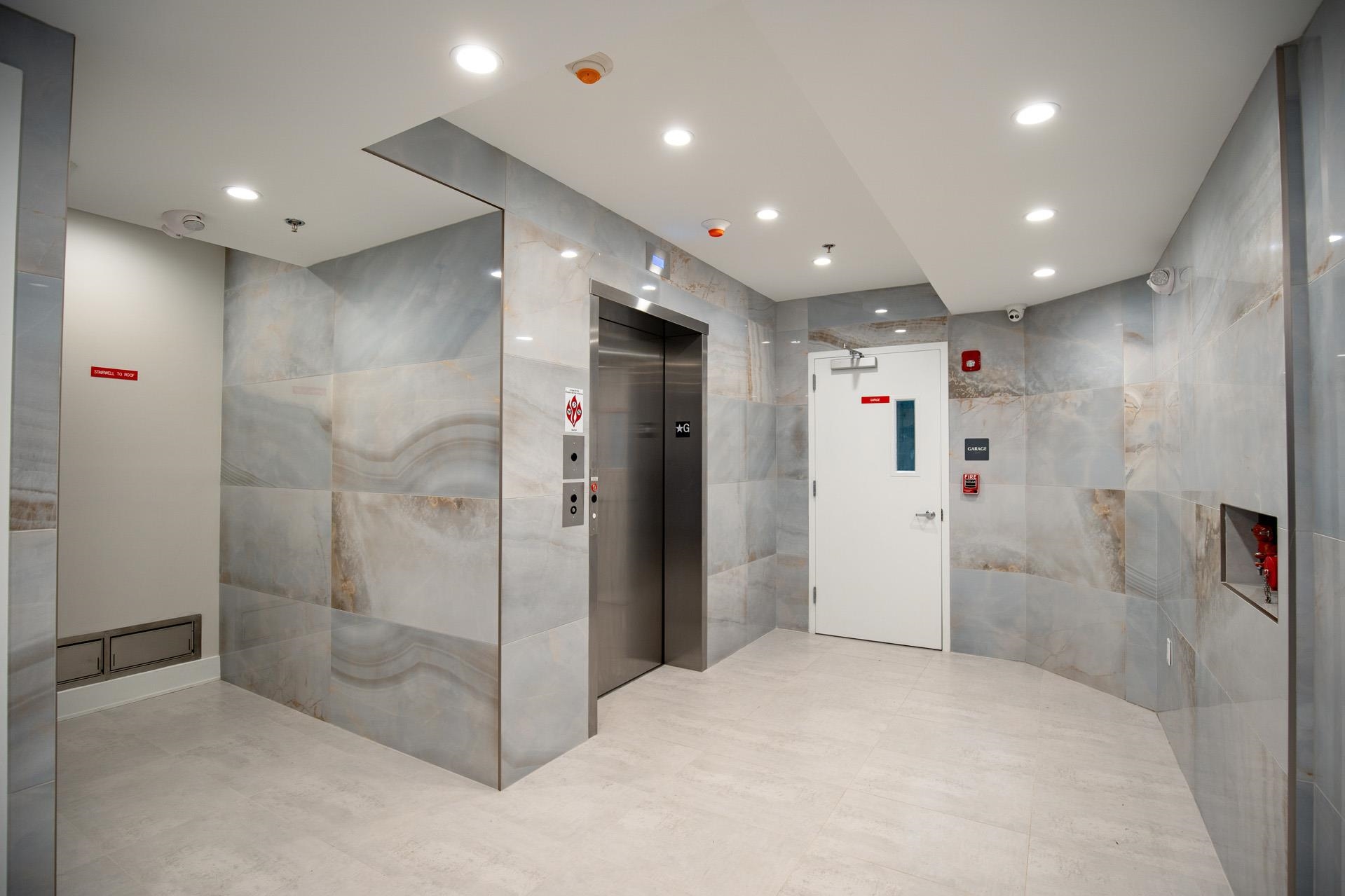 527 Monroe Street, Unit 3R Hoboken, NJ 07030 - Photo 22 of 22 a bathroom with a shower and a glass door