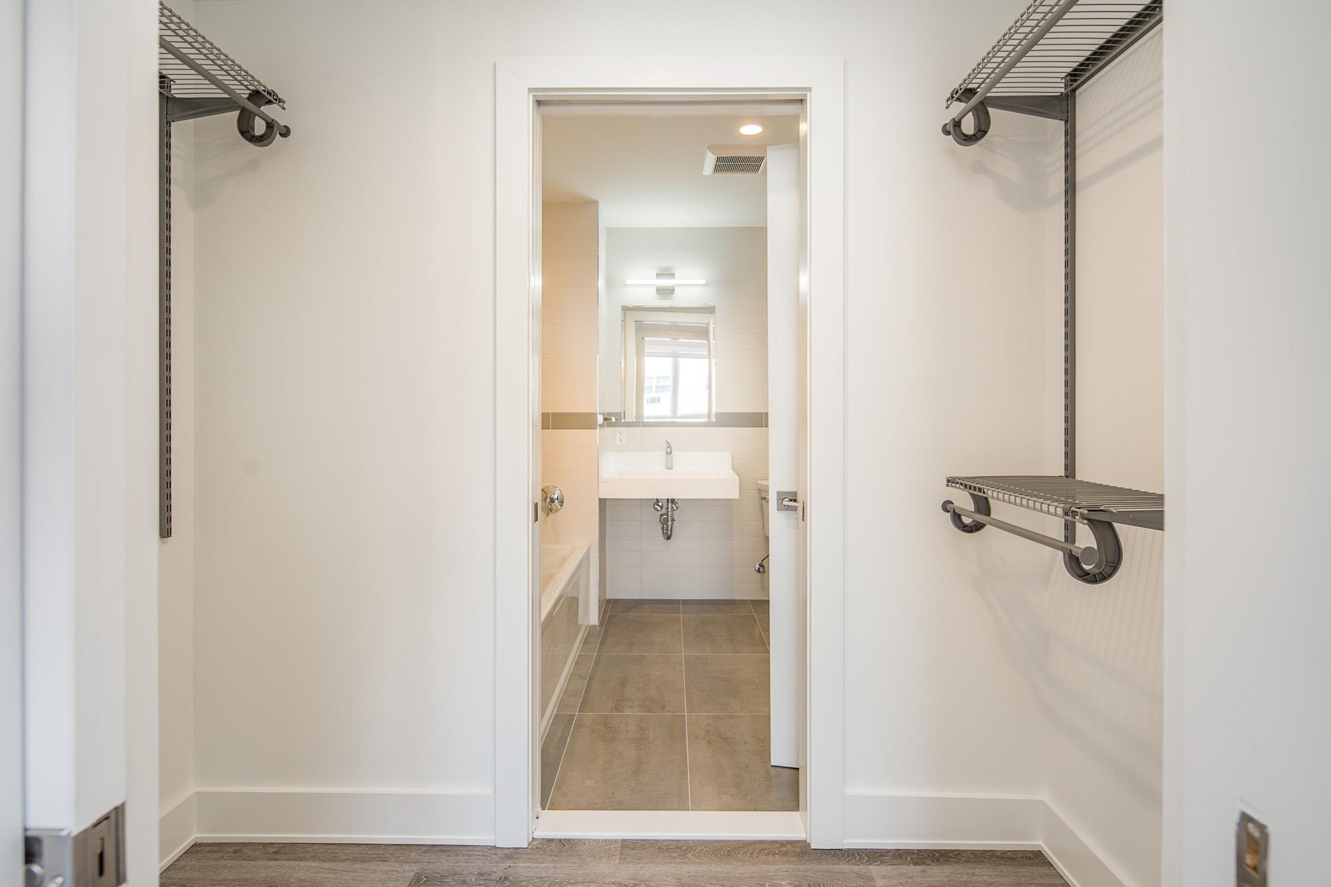 527 Monroe Street, Unit 3R Hoboken, NJ 07030 - Photo 6 of 22 a view of a bathroom from the hallway