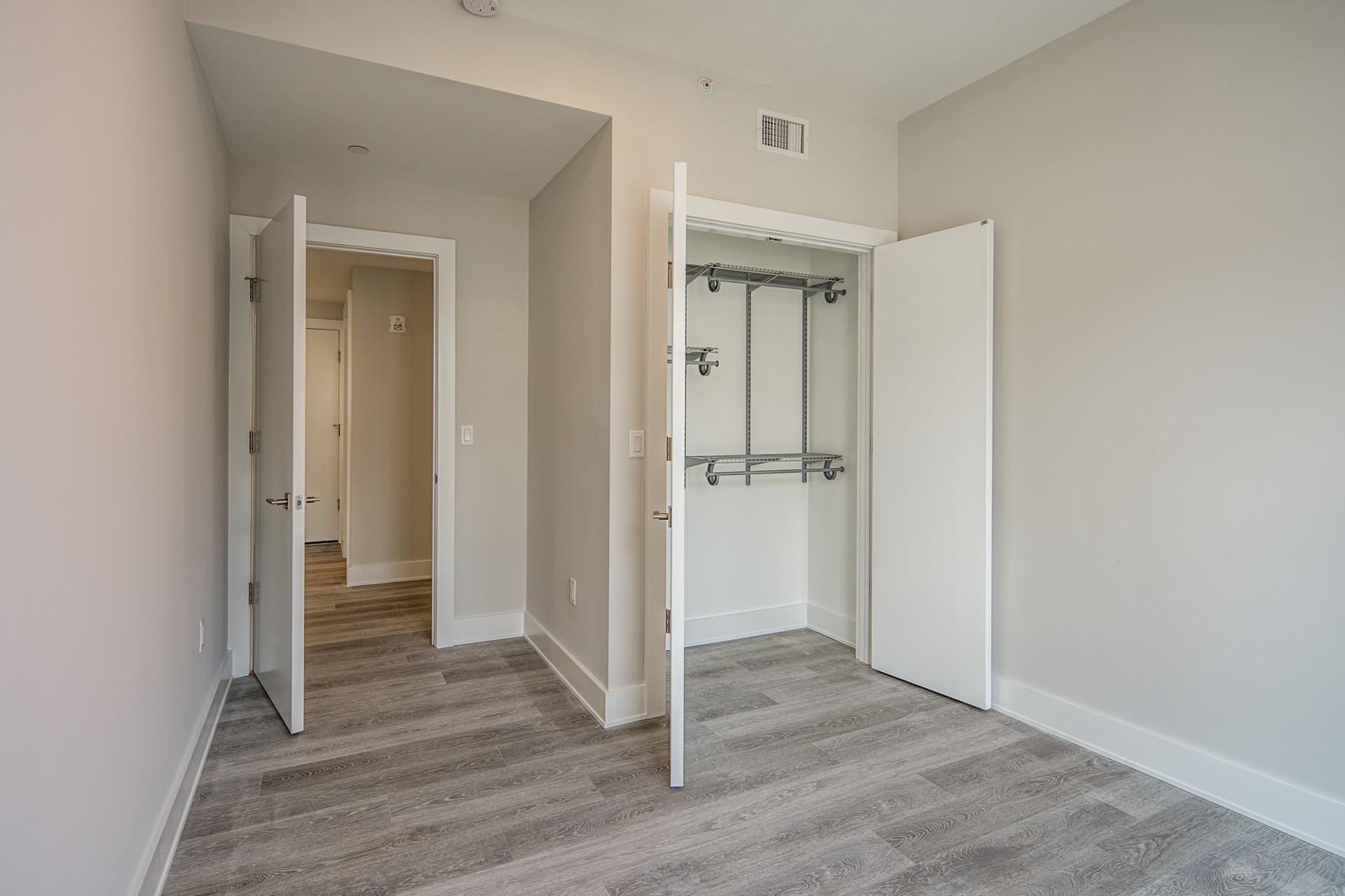 527 Monroe Street, Unit 3R Hoboken, NJ 07030 - Photo 9 of 22 a view of a hallway with wooden floor