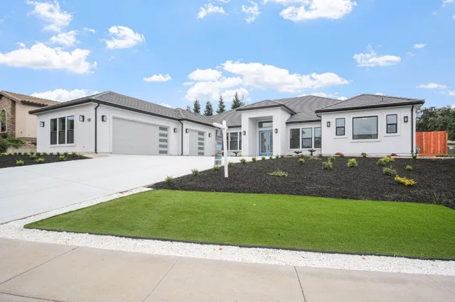 a view of a livingroom with furniture and a table