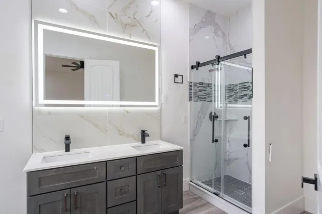 a bathroom with a sink and a mirror