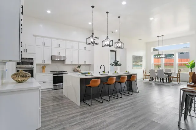 a view of a bathroom with a bathtub and shower