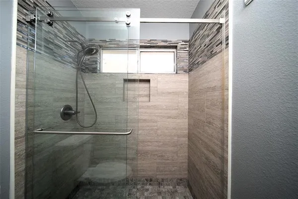 a bathroom that has a shower