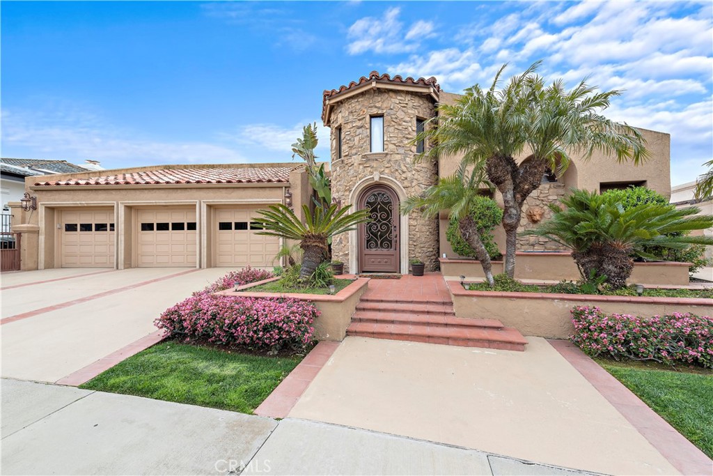 45 Marbella Dana Point, CA 92629 - Photo 1 of 1 a front view of a house with garden