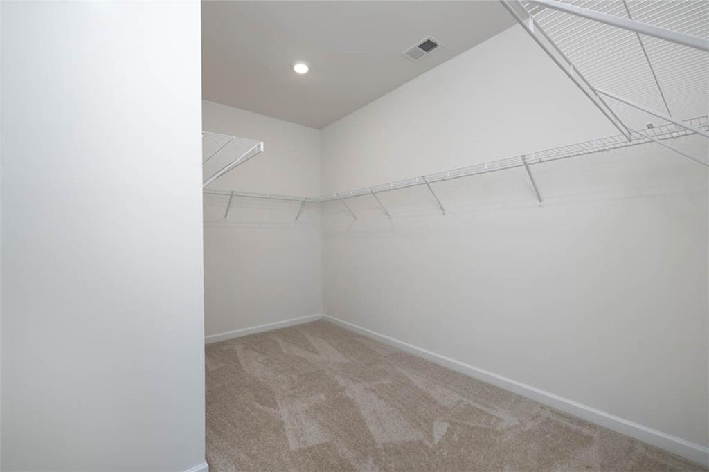 212 Umber Road Monticello, GA 31064 - Photo 13 of 30 a view of a room with racks on the wall