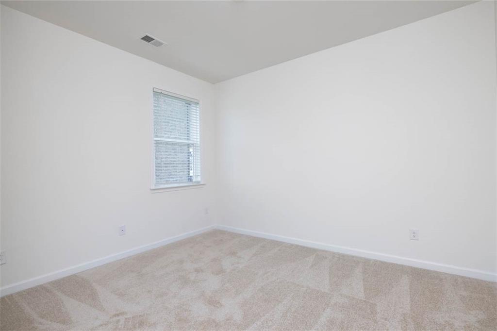 212 Umber Road Monticello, GA 31064 - Photo 17 of 30 an empty room with a window