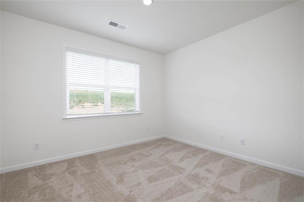 212 Umber Road Monticello, GA 31064 - Photo 19 of 30 an empty room with a window