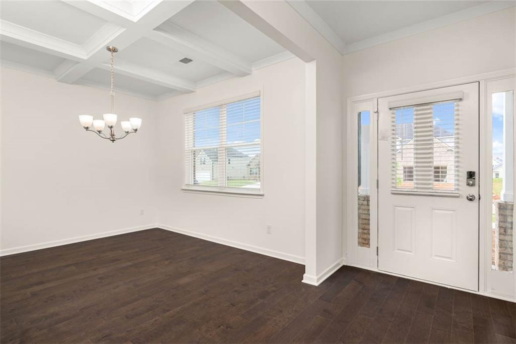 212 Umber Road Monticello, GA 31064 - Photo 4 of 30 wooden floor in an empty room with a window
