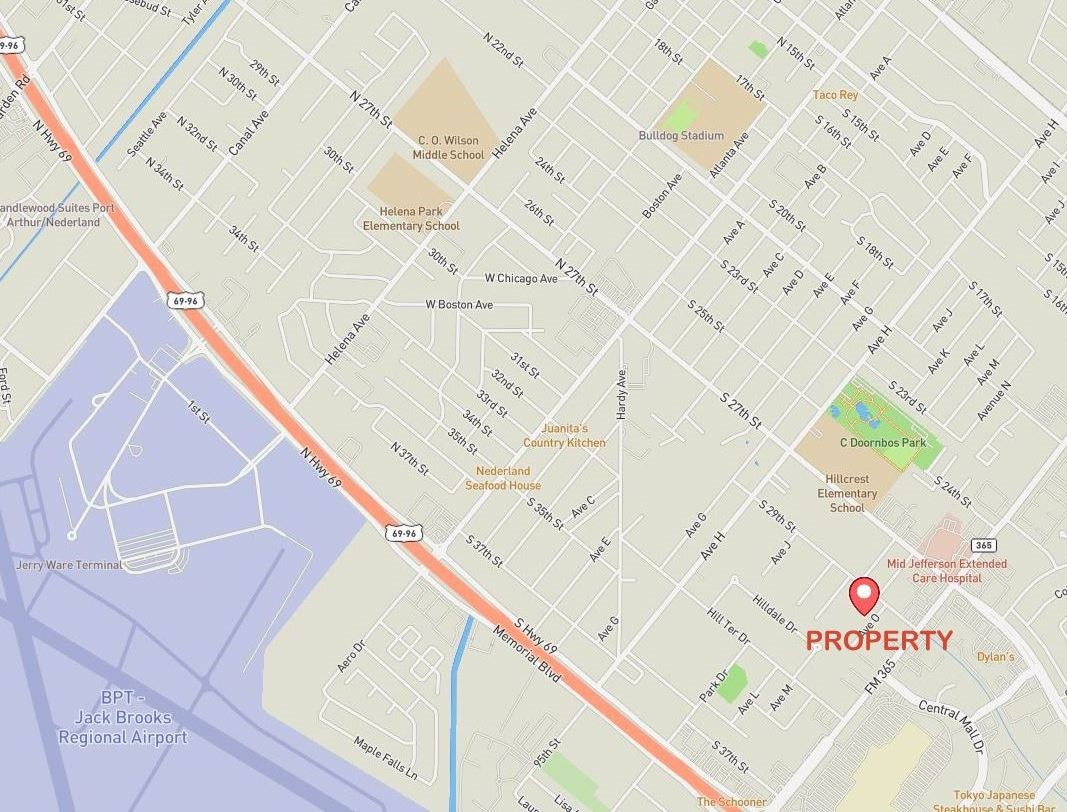 1420 South 29th Street Nederland, TX 77627 - Photo 12 of 19 wooden floor with a white comforter