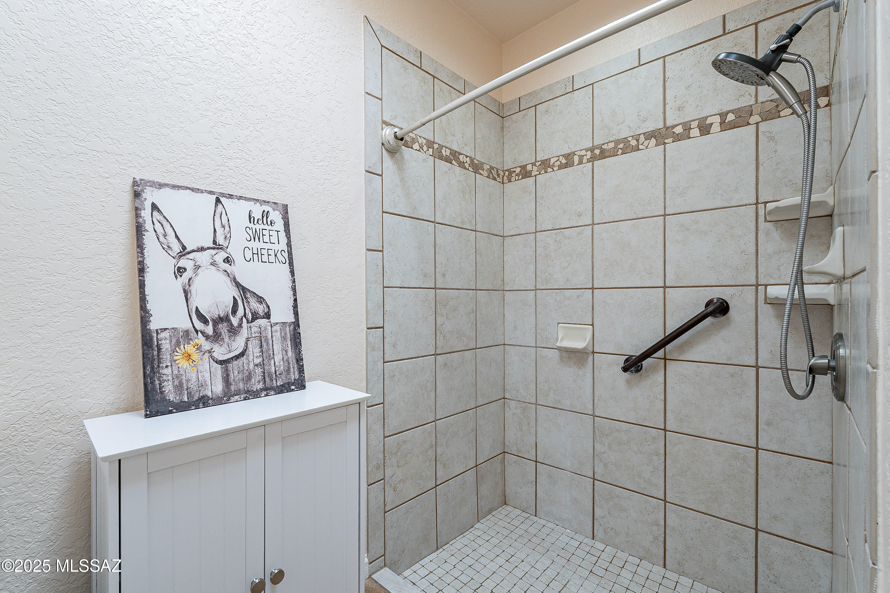 467 Camino Osito Rio Rico, AZ 85648 - Photo 25 of 50 a bathroom with a shower