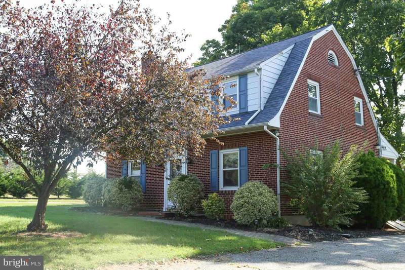 2429 Baldwin Mill Road Baldwin, MD 21013 - Photo 2 of 30 a front view of a house with garden