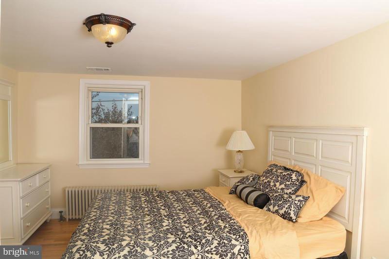 2429 Baldwin Mill Road Baldwin, MD 21013 - Photo 17 of 30 a bedroom with a bed and a window