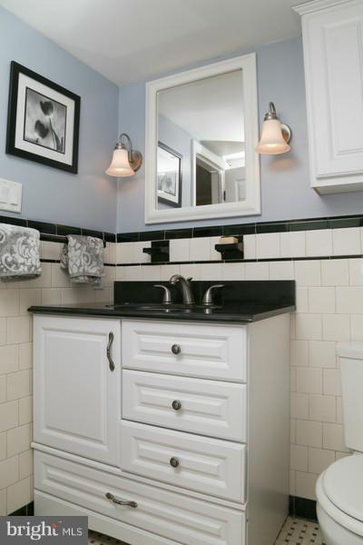 2429 Baldwin Mill Road Baldwin, MD 21013 - Photo 24 of 30 a bathroom with a sink and a mirror