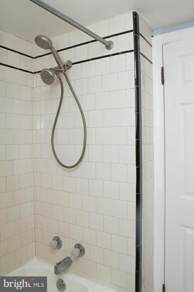 2429 Baldwin Mill Road Baldwin, MD 21013 - Photo 25 of 30 a bathroom with a shower and a glass shower door