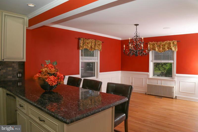 2429 Baldwin Mill Road Baldwin, MD 21013 - Photo 8 of 30 a view of a dining room with furniture and chandelier